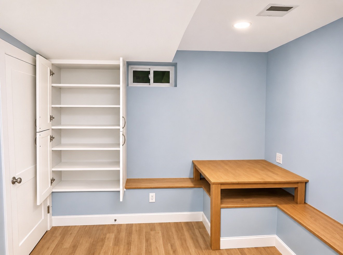 Finished basement with built-in bench, new floor and painted walls
